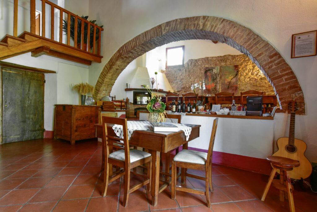 The dining room under the stone arch